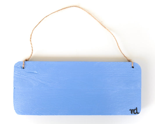 Einzigartiges Dekoschild aus Holz mit insprierendem Zitat in blau